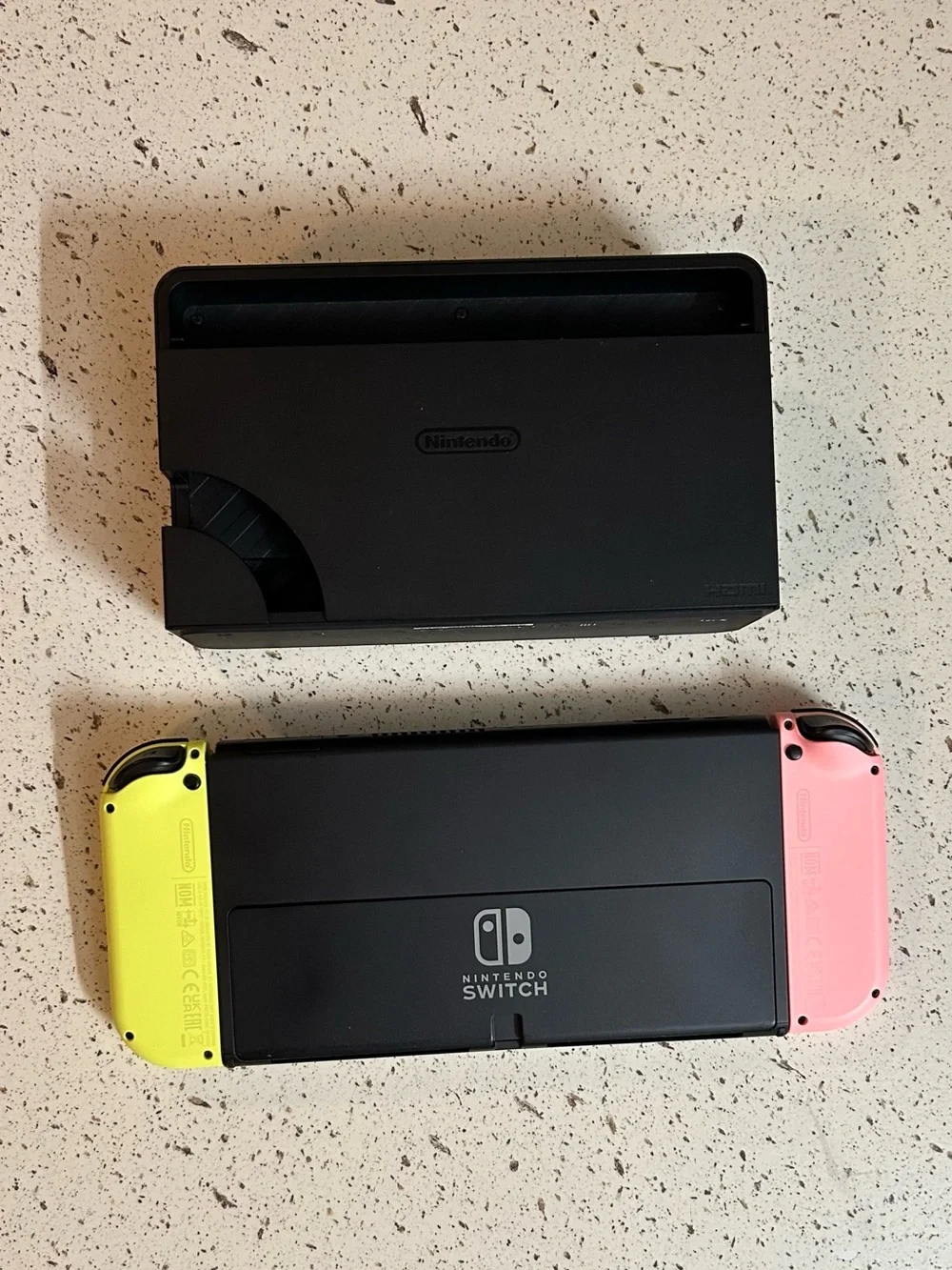 Nintendo Switch with Pastel Pink and Yellow Joycons + Accessories (Preowned)